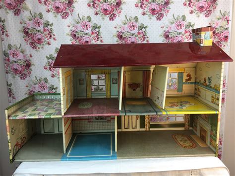 metal doll houses 1950s|vintage tin doll houses 1950.